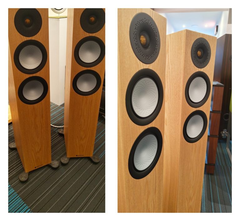 Pair of Monitor Audio Silver 200 7G floorstanding speakers in ash finish: front view in the showroom, and an angled close view of the drivers and ash cabinet